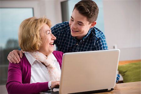 simsearch:700-07584811,k - Teenage boy with grandmother working on notebook computer, Germany Stock Photo - Rights-Managed, Code: 700-07584783