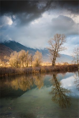 rivers and trees in winter - Bare Trees by Lake near Revine Lago, Province of Treviso, Veneto, Italy Stock Photo - Rights-Managed, Code: 700-07636953