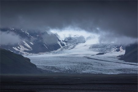 Scenic view of glaicer with storm clouds in spring, Skaftafell, Iceland Stock Photo - Rights-Managed, Code: 700-07760036