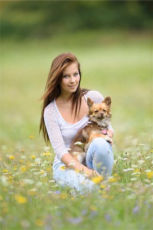 simsearch:700-06282065,k - Close-up of a young woman with her chihuahua dog in a flower meadow in summer, Upper Palatinate, Bavaria, Germany Stock Photo - Rights-Managed, Code: 700-07760211