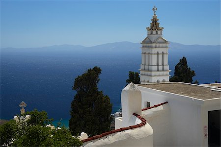 rooftop in greece - Scenic view of white Greek orthodox church near the sea, Tinos, Cyclades Islands, Greece Stock Photo - Rights-Managed, Code: 700-07783717