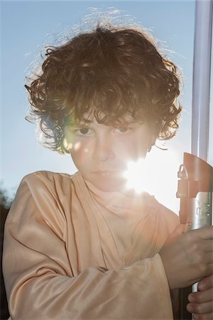role playing - Portrait of Boy with Lightsaber Stock Photo - Rights-Managed, Code: 700-07802826