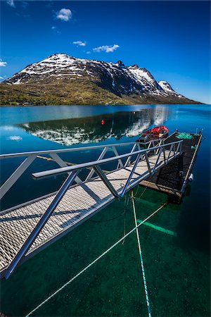 Dock and mountain, Ersfjordbotn on the Island of Kvaloya, near Tromsoe, Troms, Northern Norway, Norway Stock Photo - Rights-Managed, Code: 700-07849688