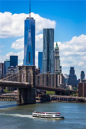 simsearch:700-05609803,k - Tour boat on the East River, Brooklyn Bridge and Manhattan Skyline with One World Trade Center and New York by Gehry, New York City, New York, USA Stock Photo - Rights-Managed, Code: 700-07849716