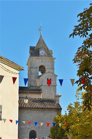 Church Steeple with Pennants in French National Colors, Sault, Vaucluse, Provence, France Stock Photo - Rights-Managed, Code: 700-07968185