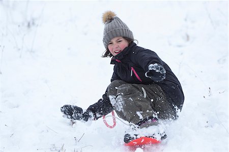 Girl Playing Outdoors in Snow, Upper Palatinate, Bavaria, Germany Foto de stock - Con derechos protegidos, Código: 700-08002294