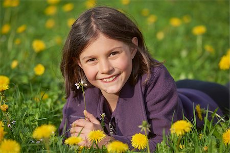 spring close up - Close-up of Girl Lying in Meadow in Spring, Upper Palatinate, Bavaria, Germany Stock Photo - Rights-Managed, Code: 700-08059864