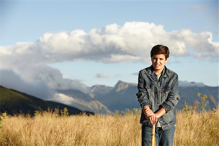Portrait of Teenager Hiking with Apennine Mountains in background, from Campotosto, Monti della Laga, Gran Sasso e Monti della Laga National Park, Abruzzo, Italy Stock Photo - Rights-Managed, Code: 700-08102847