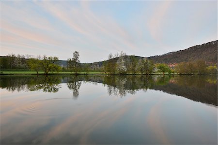 Landscape Reflected in River Main on Spring Morning, Collenberg, Lower Franconia, Spessart, Miltenberg District, Bavaria, Germany Stock Photo - Rights-Managed, Code: 700-08146243