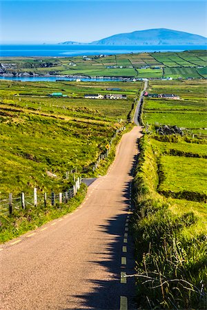 road hills in europe - Road and scenic overview of farmland, Portmagee along the Skellig Coast on the Ring of Kerry, County Kerry, Ireland Stock Photo - Rights-Managed, Code: 700-08146399