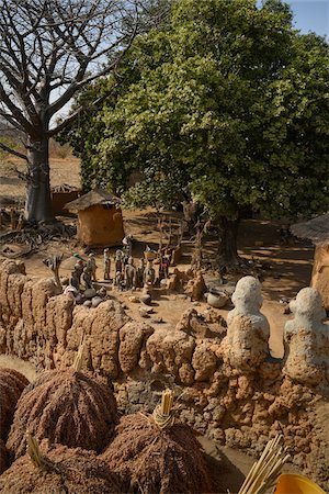 superstition - Talisman watching over millet drying on courtyard of local witch doctor, near Gaoua, Poni Province, Burkina Faso Stock Photo - Rights-Managed, Code: 700-08169171