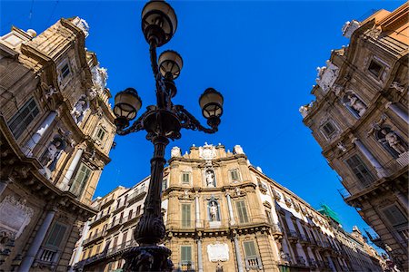 South, West and North buildings at Piazza Vigliena (Quattro Canti) with a silhouette of a lamp post on Corso Vittorio Emanuele in the historic center of Palermo in Sicily, Italy Stock Photo - Rights-Managed, Code: 700-08701891