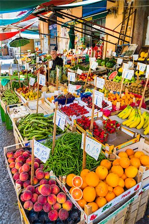 small business, inventory - Business owner at fruit and vegetable stand in the hisroic Ballaro Market in Palermo, Sicily in Italy Stock Photo - Rights-Managed, Code: 700-08701917