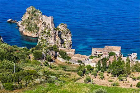 simsearch:700-05803759,k - Elevated view of the coastline with the historic Tonnara di Scopello (Old Tuna Factory) estate in Scopello in the Province of Trapani in Sicily, Italy Stock Photo - Rights-Managed, Code: 700-08701944