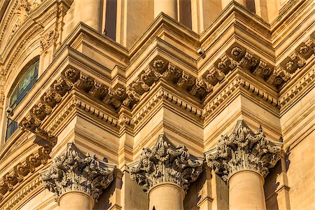 simsearch:700-08723105,k - Detail of the ornate mouldings and capitals of pillars of the Cathedral of Saint George (Duomo di San Giorgio) in Ragusa in Sicily, Italy Stock Photo - Rights-Managed, Code: 700-08723104