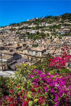 simsearch:700-07279101,k - Flowering shrubs and overview of the historical city of Modica on the mountain side in the Province of Ragusa in Sicily, Italy Stock Photo - Rights-Managed, Code: 700-08723121