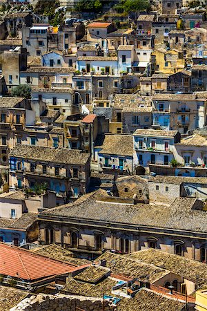 simsearch:700-07279101,k - Overview of rooftops of compacted homes made of stone in historical Modica in Sicily, Italy Stock Photo - Rights-Managed, Code: 700-08723123