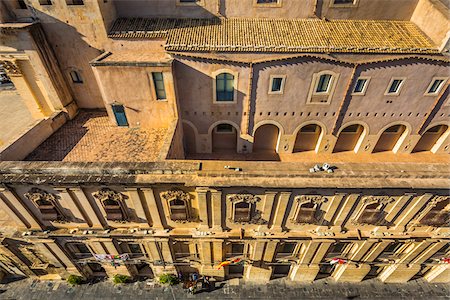 simsearch:855-08420585,k - High angle view of stone balconies and rooftop of historic buildings in the city of Noto in the Province of Syracuse in Sicily, Italy Stock Photo - Rights-Managed, Code: 700-08723157