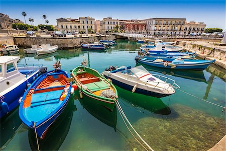 syracuse - Traditional Fishing Boats Moored in Harbour, Ortygia, Syracuse, Sicily, Italy Stock Photo - Rights-Managed, Code: 700-08723270