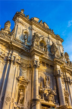 simsearch:700-08723105,k - Baroque facade of the Church of Saint John the Baptist against a blue sky in Lecce in Puglia, Italy Stock Photo - Rights-Managed, Code: 700-08739605