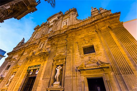 statues on building top - he imposing facade of the Baroque Cathedral of Saint Agatha in Gallipoli in Puglia, Italy Stock Photo - Rights-Managed, Code: 700-08739625