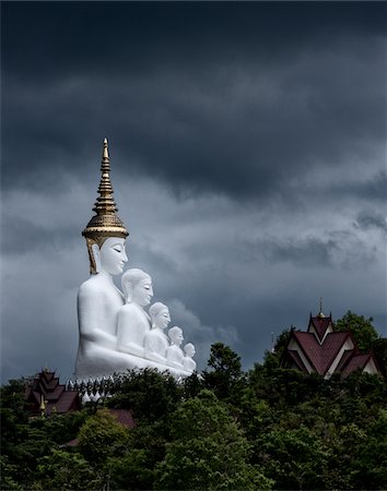 simsearch:700-00795780,k - Five Sitting Buddhas statue at Wat Pha Sorn Kaew located in Khao Kho, Petchaboon in north-central Thailand. Foto de stock - Con derechos protegidos, Código: 700-08743688