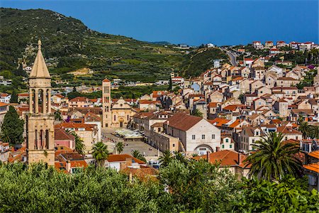 playhouse - Overview of Old Town of Hvar with the bell tower of St Mark's Church (far left) and St Stephen's Cathedral (left) and the Hvar Theater (center) on Hvar Island, Croatia Stock Photo - Rights-Managed, Code: 700-08765391