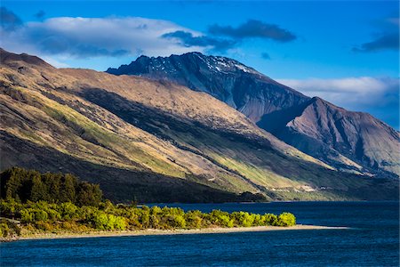 dramatize - Sunlight reflecting on mountains at Glenorchy in the Otago Region of New Zealand Stock Photo - Rights-Managed, Code: 700-08765561
