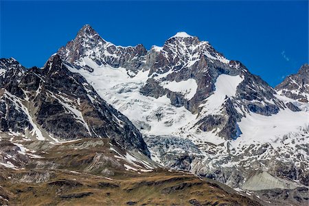 simsearch:600-07278765,k - Mountain tops of the Swiss Alps on a sunny day at Zermatt, Switzerland Stock Photo - Rights-Managed, Code: 700-08986356