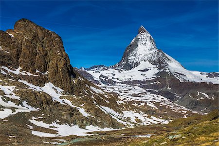 pennine alps - Rocky landsacpae and moorland with the Matterhorn in the background at Zermatt, Switzerland. Stock Photo - Rights-Managed, Code: 700-08986364