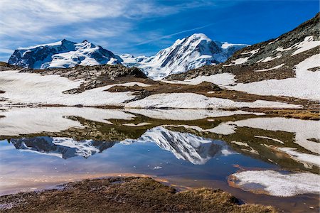 simsearch:600-07278765,k - Riffelsee Lake with reflections of the snow covered mountains of the Swiss Alps in spring at Zermatt, Switzerland Stock Photo - Rights-Managed, Code: 700-08986367