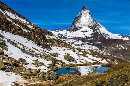 pennine alps - Scree from the surrounding mountains with the Matterhorn in the background at Zermatt, Switzerland Stock Photo - Rights-Managed, Code: 700-08986369
