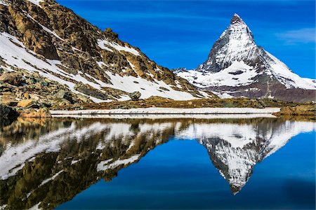pennine alps - The Matterhorn reflected in a lake near Riffelsee at Zermatt, Switzerland Stock Photo - Rights-Managed, Code: 700-08986375