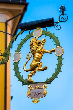 simsearch:400-05716374,k - Close-up of sign of a golden lion in the Old Town of Innsbruck, Austria Stock Photo - Rights-Managed, Code: 700-08986424