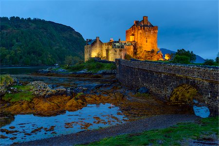 simsearch:700-04003402,k - Eilean Donan Castle illuminated at dusk near Kyle of Lochalsh in Scotland, United Kingdom Stock Photo - Rights-Managed, Code: 700-08986528