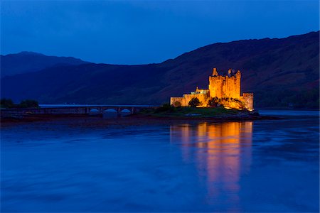 simsearch:700-04003402,k - Eilean Donan Castle illuminated at dusk near Kyle of Lochalsh in Scotland, United Kingdom Stock Photo - Rights-Managed, Code: 700-08986531