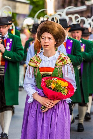 simsearch:841-07205349,k - Close-up of woman and musicians in Austrian traditional dress at the Feast of Corpus Christi Procession in Seefeld, Austria Stock Photo - Rights-Managed, Code: 700-08986548