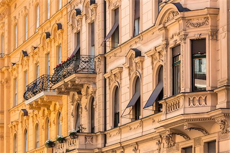 pastel - Detail of traditional buildings with balconets and ornate stonework window frames in the of Bolzano, Italy Stock Photo - Rights-Managed, Code: 700-08986559