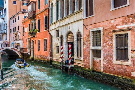 simsearch:862-05998030,k - Motorboat travelling along a canal lined with historical buildings in Venice, Italy Stock Photo - Rights-Managed, Code: 700-08986684