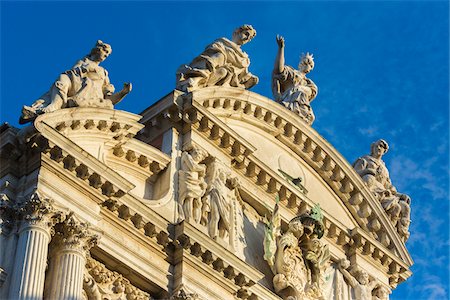 statues on building top - Close-up of the rooftop of St Mary of the Lily Church (Chiesa di Santa Maria del Giglio) in Venice, Italy Stock Photo - Rights-Managed, Code: 700-08986697