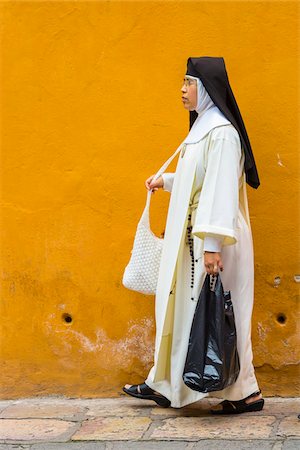 Close-up of a Catholic nun walking on street in San Miguel de Allende, Mexico Stock Photo - Rights-Managed, Code: 700-09071036