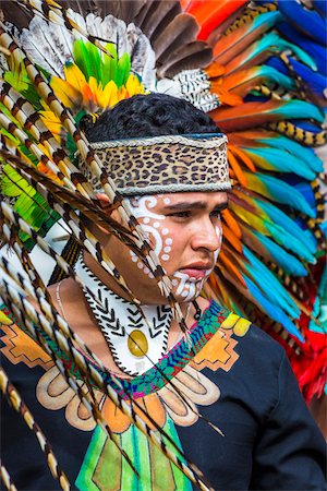 simsearch:614-02679643,k - Close-up portrait of an indigenous tribal dancer wearing a feathered headress in the St Michael Archangel Festival parade in San Miguel de Allende, Mexico Stock Photo - Rights-Managed, Code: 700-09088053