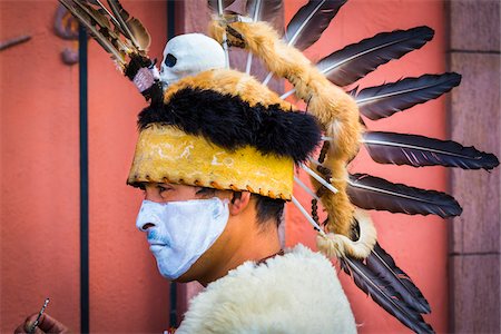simsearch:614-02679643,k - Close-up portrait of a male, indigenous tribal dancer wearing feathered headdress at the St Michael Archangel Festival parade in San Miguel de Allende, Mexico Stock Photo - Rights-Managed, Code: 700-09088060