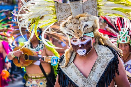 simsearch:614-02679643,k - Close-up portrait of a male, indigenous tribal dancer wearing a costume in the St Michael Archangel Festival parade in San Miguel de Allende, Mexico Stock Photo - Rights-Managed, Code: 700-09088071