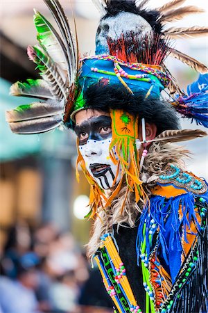 simsearch:614-02679643,k - Close-up portrait of a young male, indigenous tribal dancer in colorful costume at the St Michael Archangel Festival parade in San Miguel de Allende, Mexico Stock Photo - Rights-Managed, Code: 700-09088088