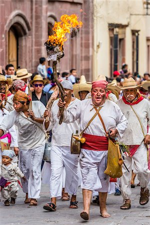 reenacting - Men in traditional clothing walking through the streets re-enacting the historic peasant revolt for Mexican Independence Day celebrations in San Miguel de Allende, Mexico Stock Photo - Rights-Managed, Code: 700-09088196