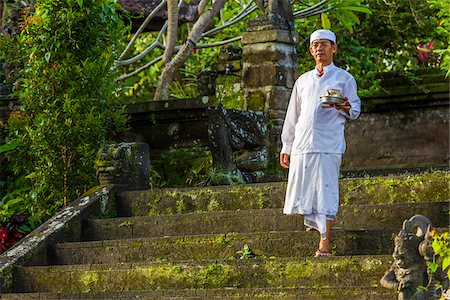 simsearch:700-00153579,k - A Balinese priest preparing for the Ngrupuk Parade on the eve of Nyepi Day in Ubud in Gianyar, Bali, Indonesia Stock Photo - Rights-Managed, Code: 700-09134719