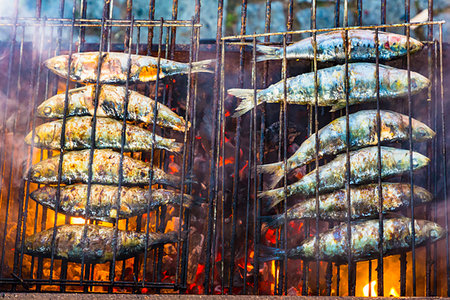 sardine barbecue - Close-up of fish barbecuing at the Festival of St John of Porto (Festa de Sao Joao do Porto), Porto, Norte, Portugal Stock Photo - Rights-Managed, Code: 700-09226611