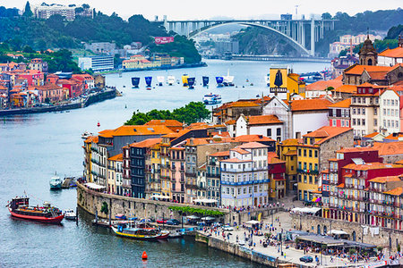 simsearch:700-07849673,k - Overview of harbor and waterfront with the Arrabida Bridge in the background in Porto, Norte, Portugal Stock Photo - Rights-Managed, Code: 700-09226636