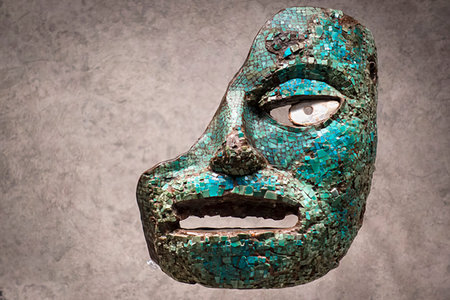 Part of an ancient, mosaic sculpture of a face in the National Museum of Anthropology (Museo Nacional de Antropologia), Mexico City, Mexico Stock Photo - Rights-Managed, Code: 700-09226914